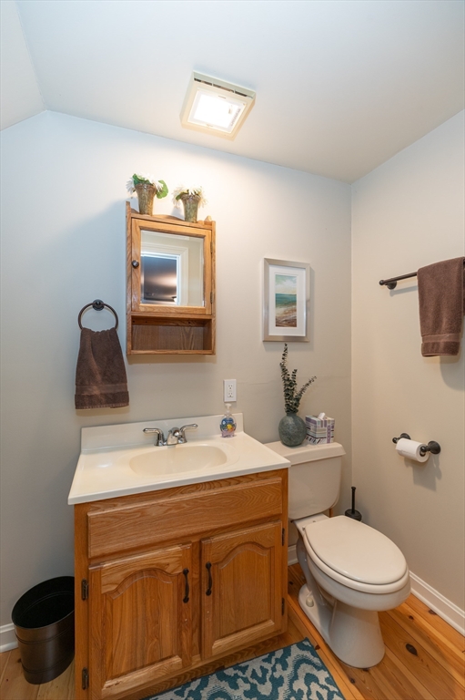 38 Kimball Avenue, Unit 5 Ipswich, MA 01938 - Photo 17 of 22 a bathroom with a toilet sink and mirror