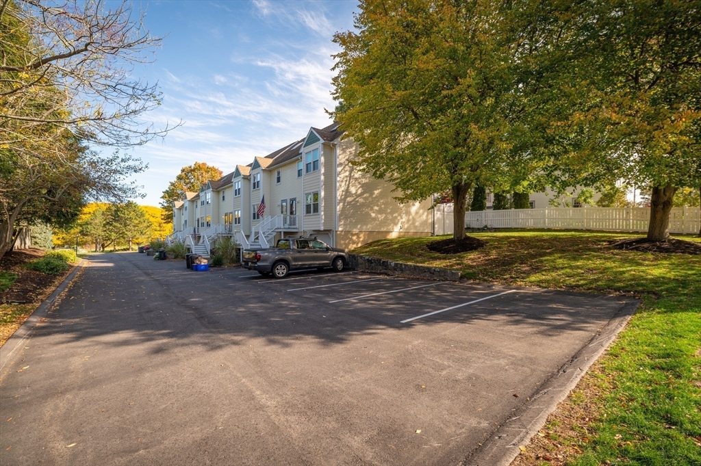 38 Kimball Avenue, Unit 5 Ipswich, MA 01938 - Photo 19 of 22 a view of a street with of a house in the background