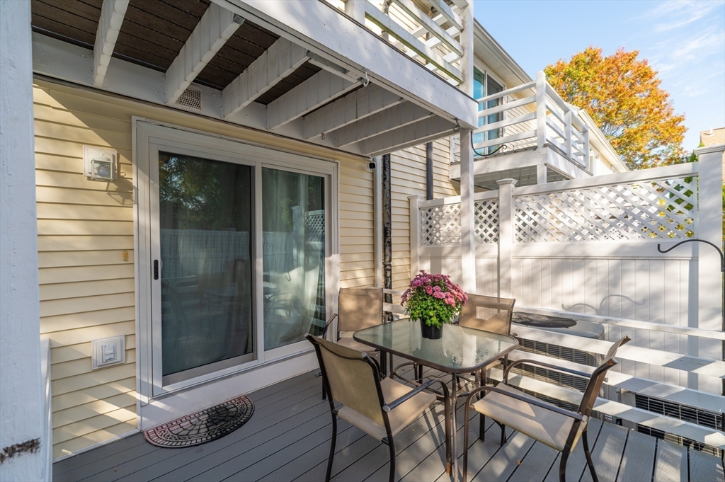 38 Kimball Avenue, Unit 5 Ipswich, MA 01938 - Photo 10 of 22 a view of a dining room with furniture and wooden floor