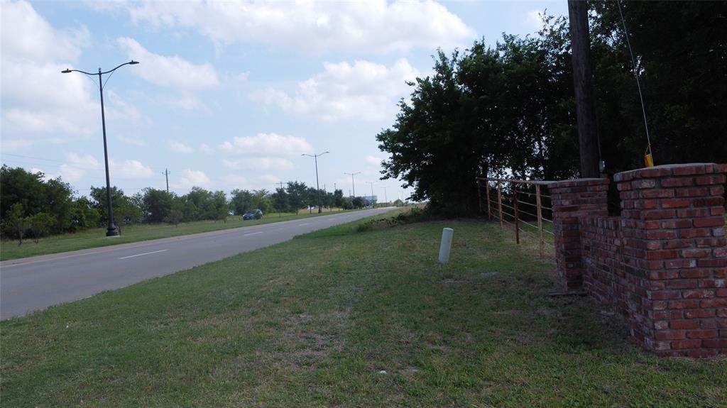 Tbd Preston Road Celina, TX 75009 - Photo 5 of 8 a view of a field with a tree in the background