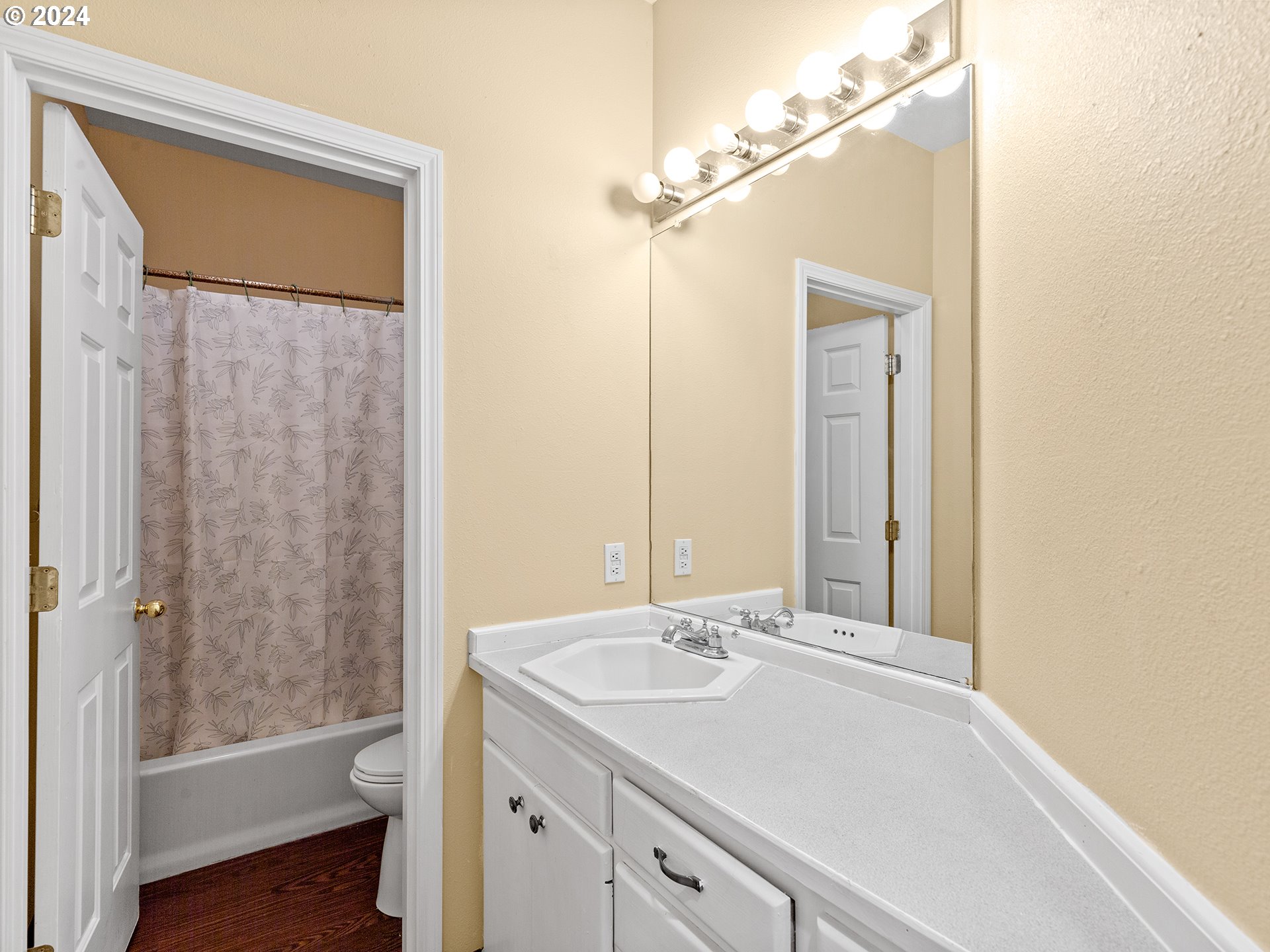 3940 Northeast Franklin Street Camas, WA 98607 - Photo 12 of 21 a bathroom with a sink a toilet and shower