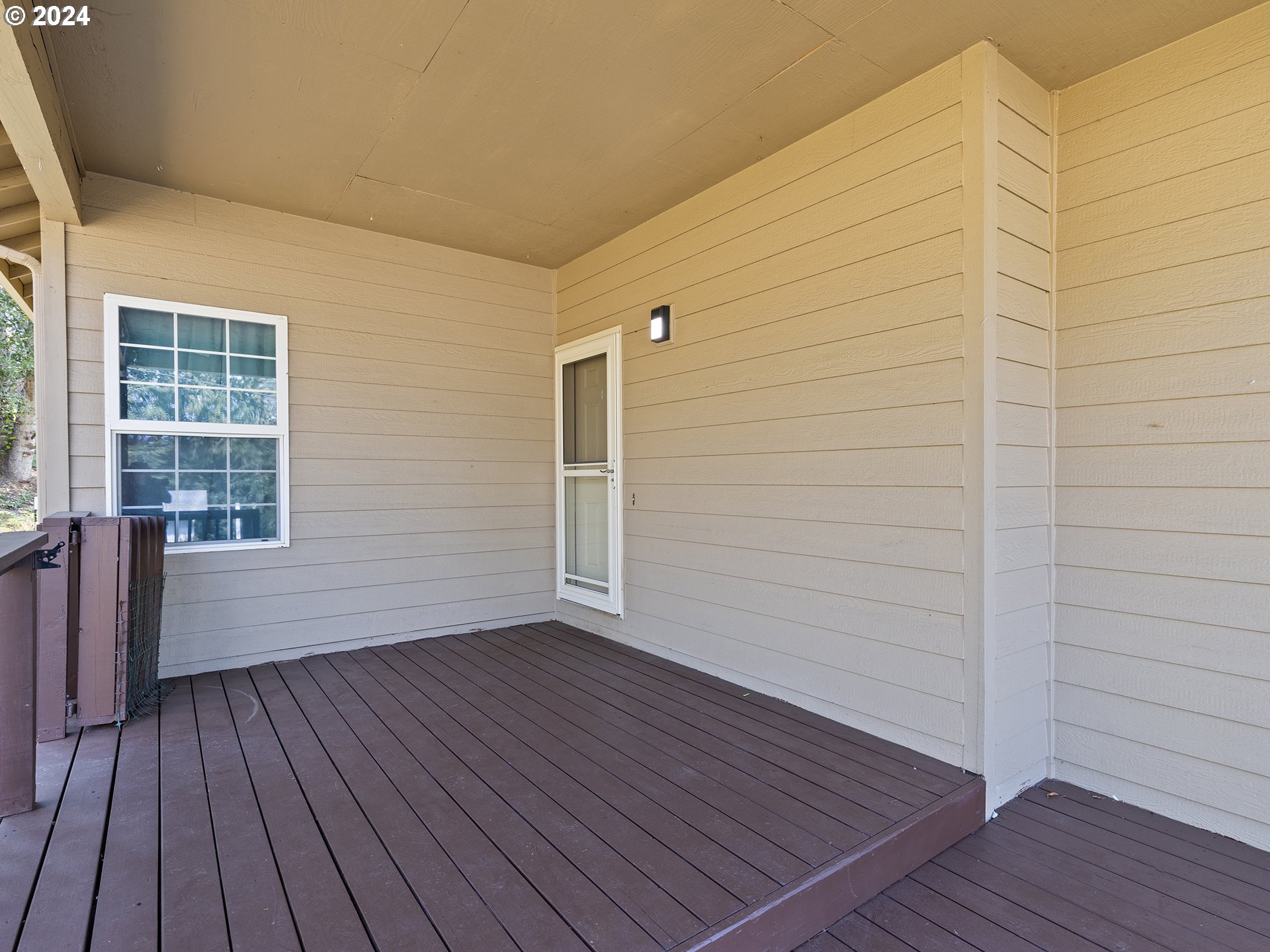 3940 Northeast Franklin Street Camas, WA 98607 - Photo 15 of 21 a view of an empty room with wooden floor and a window