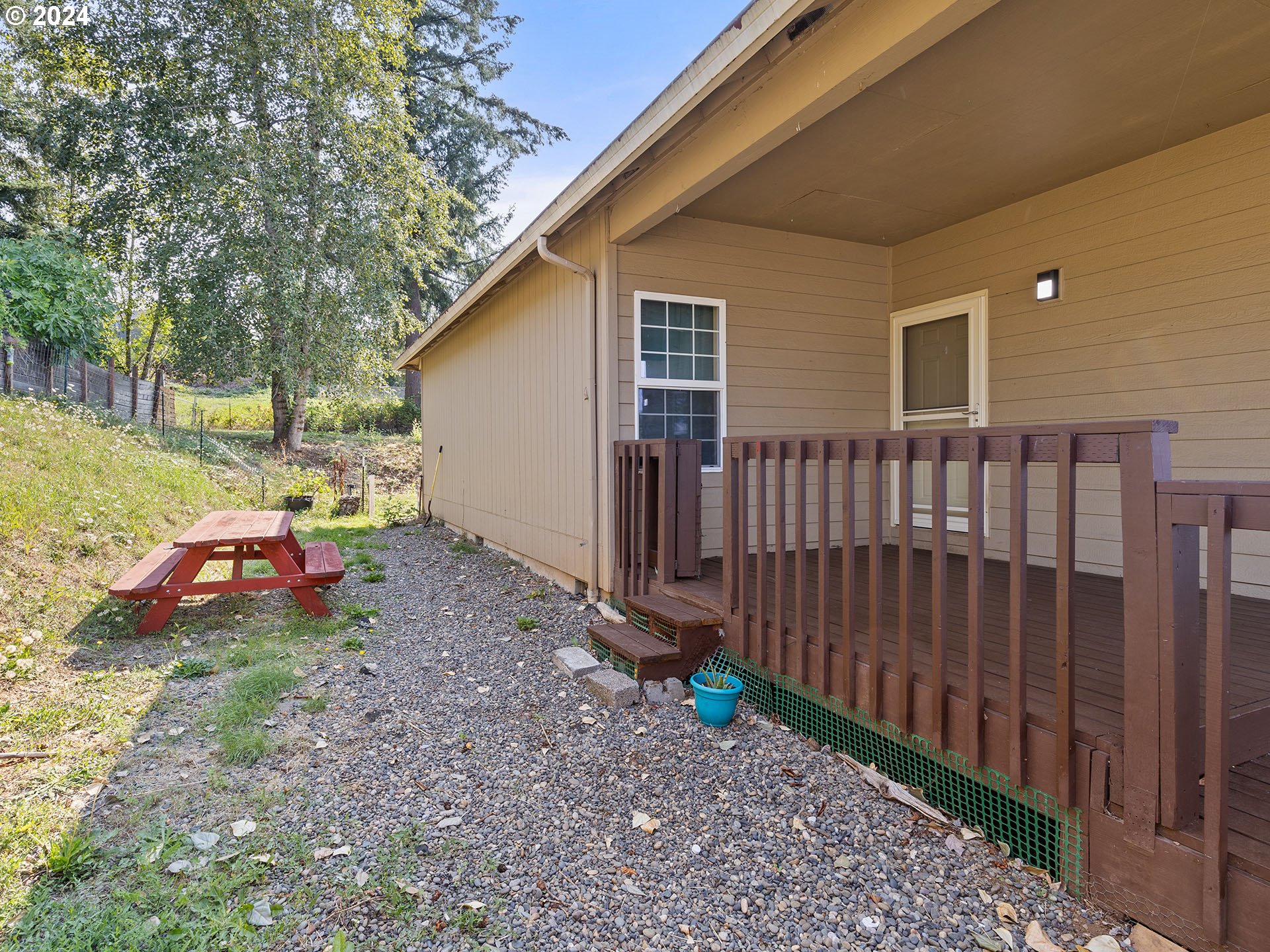 3940 Northeast Franklin Street Camas, WA 98607 - Photo 16 of 21 a view of backyard with trees