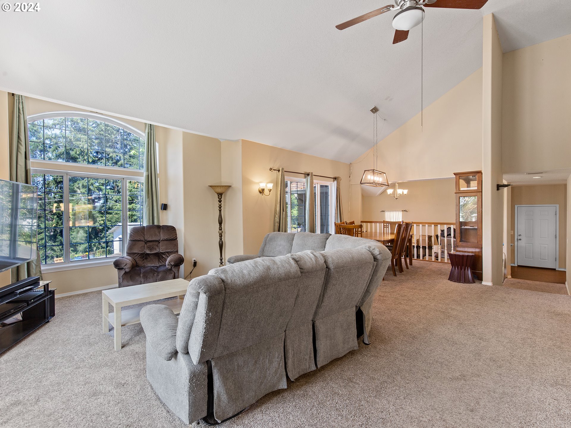 3940 Northeast Franklin Street Camas, WA 98607 - Photo 3 of 21 a living room with furniture and a flat screen tv
