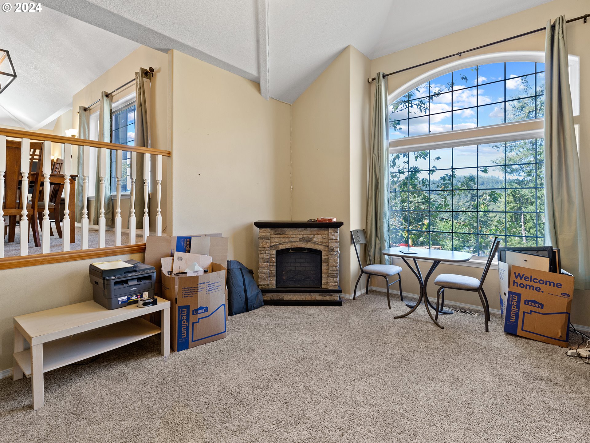 3940 Northeast Franklin Street Camas, WA 98607 - Photo 7 of 21 a living room with furniture and a fireplace