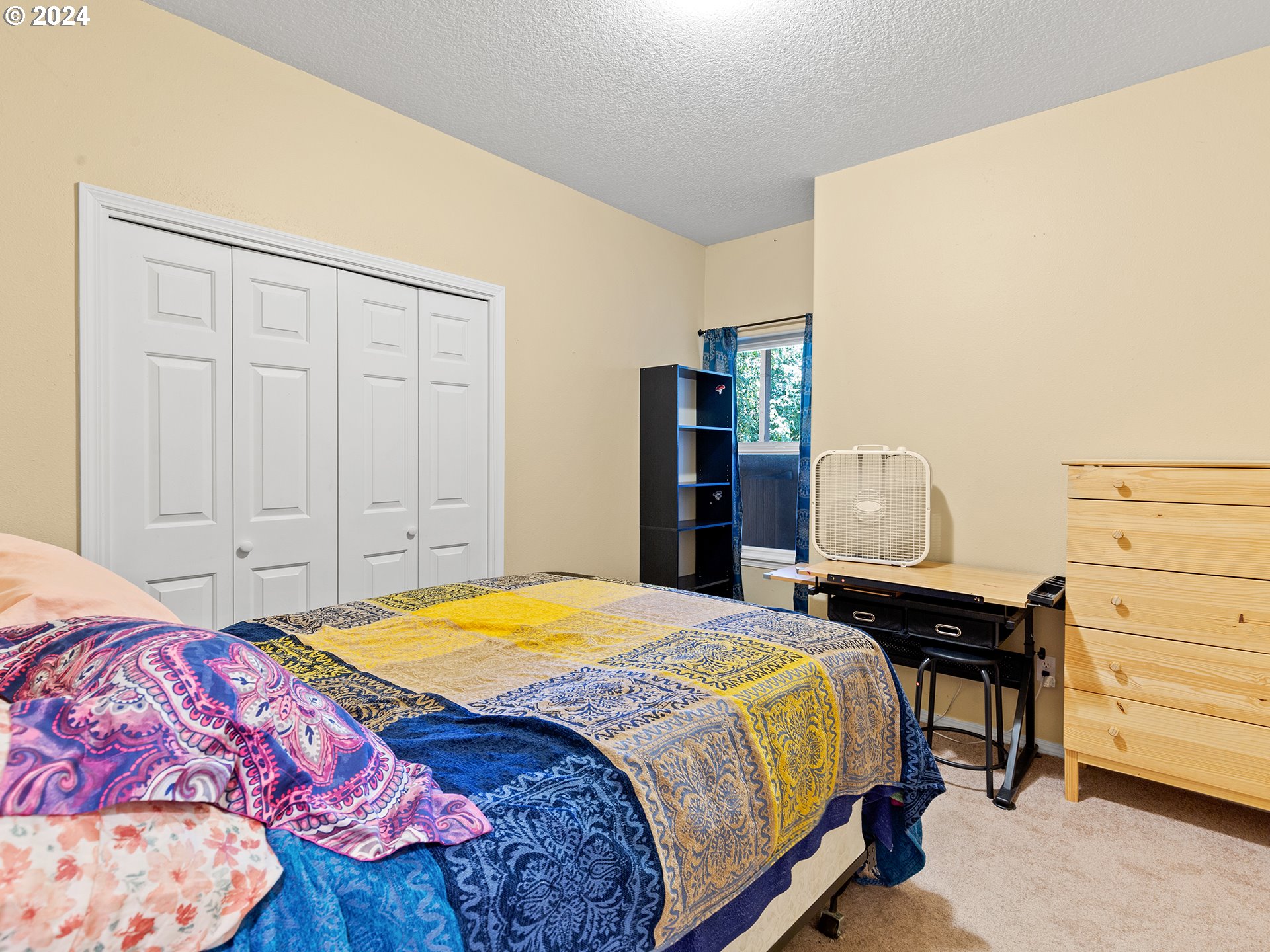 3940 Northeast Franklin Street Camas, WA 98607 - Photo 10 of 21 a bedroom with a bed and a dresser