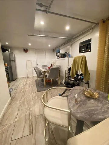 a kitchen with stainless steel appliances granite countertop a sink and cabinets