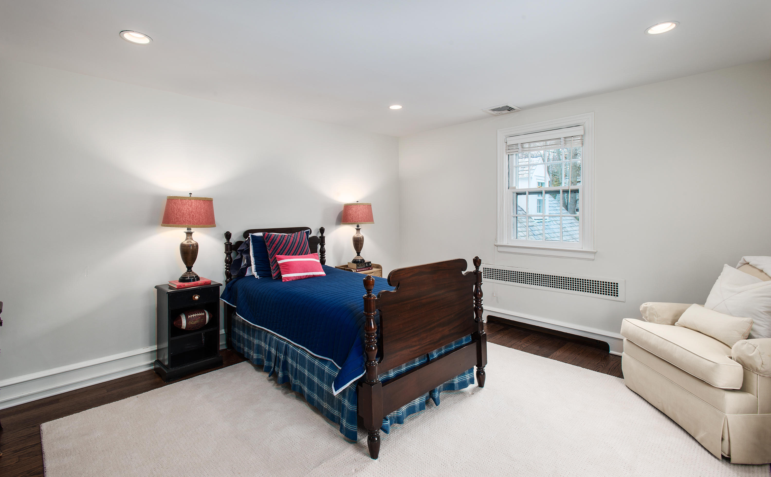 33 Birch Road Darien, CT 06820 - Photo 14 of 33 a bedroom with a bed and window