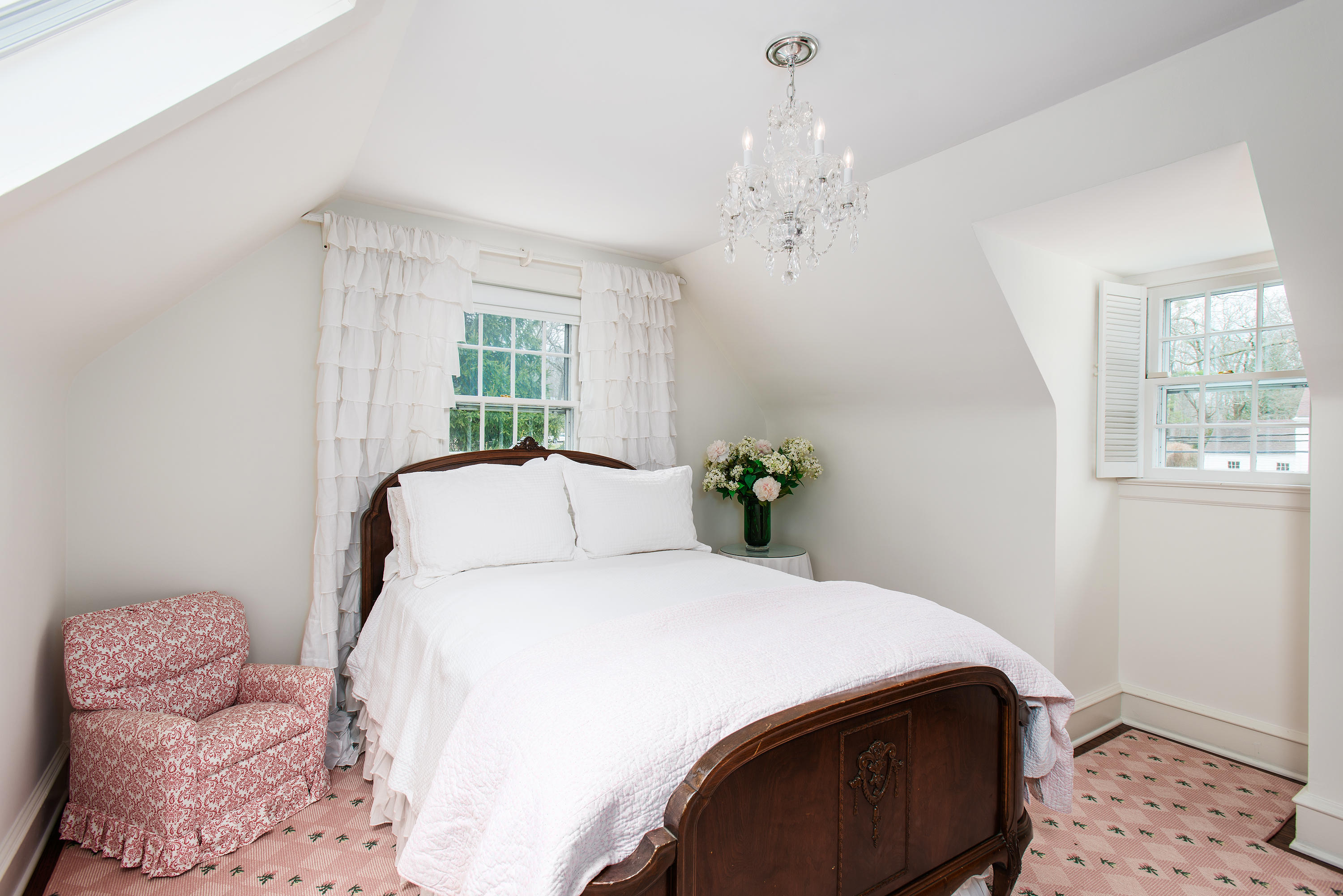 33 Birch Road Darien, CT 06820 - Photo 17 of 33 a bedroom with a bed and a window