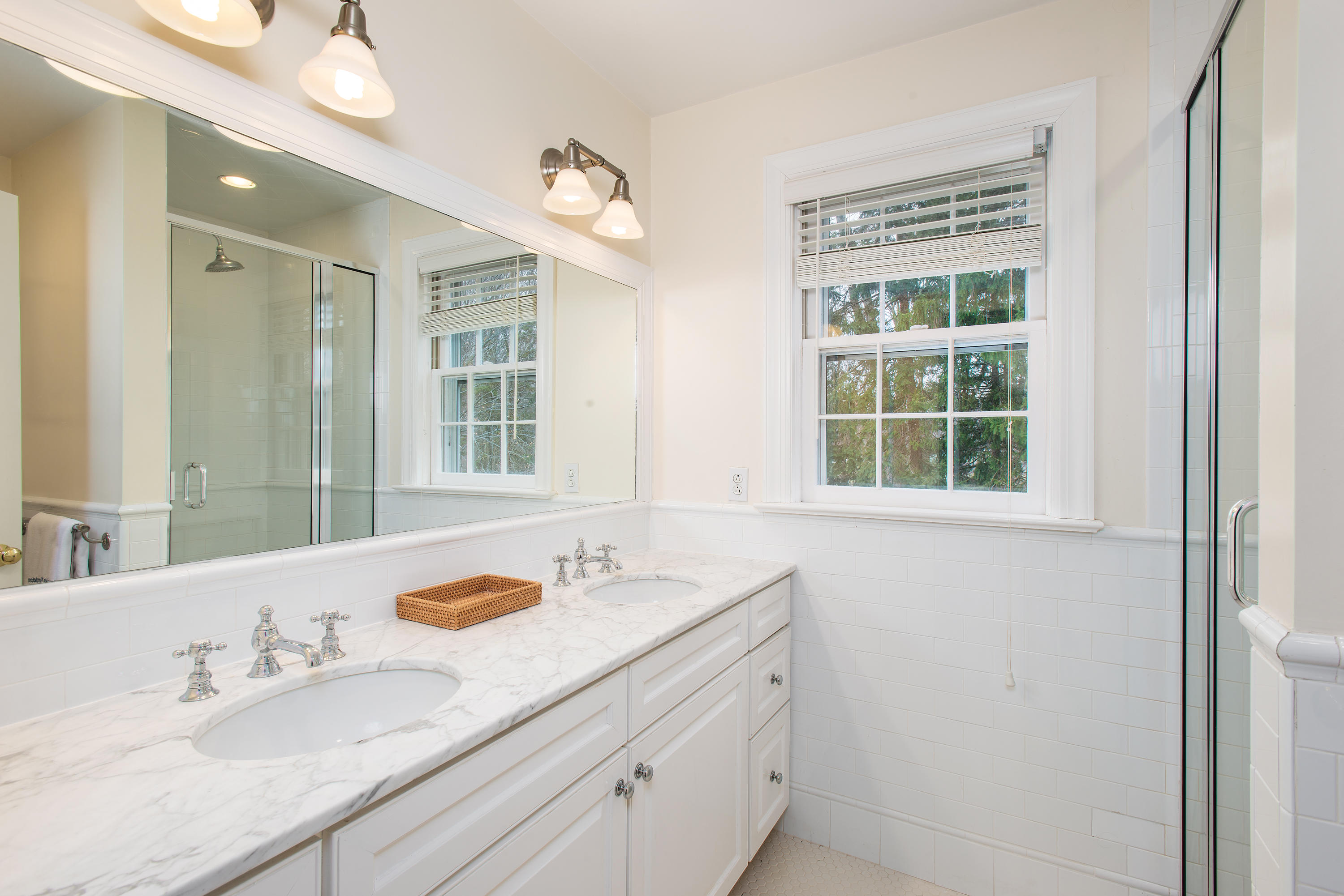 33 Birch Road Darien, CT 06820 - Photo 19 of 33 a bathroom with a granite countertop sink mirror and double