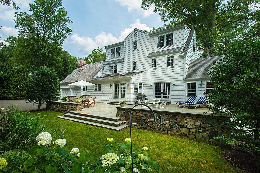 33 Birch Road Darien, CT 06820 - Photo 3 of 33 a view of a house with swimming pool and porch with furniture