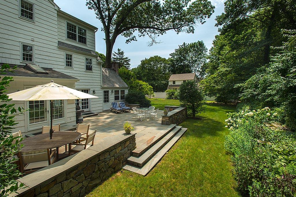 33 Birch Road Darien, CT 06820 - Photo 24 of 33 a view of a house with backyard and sitting area