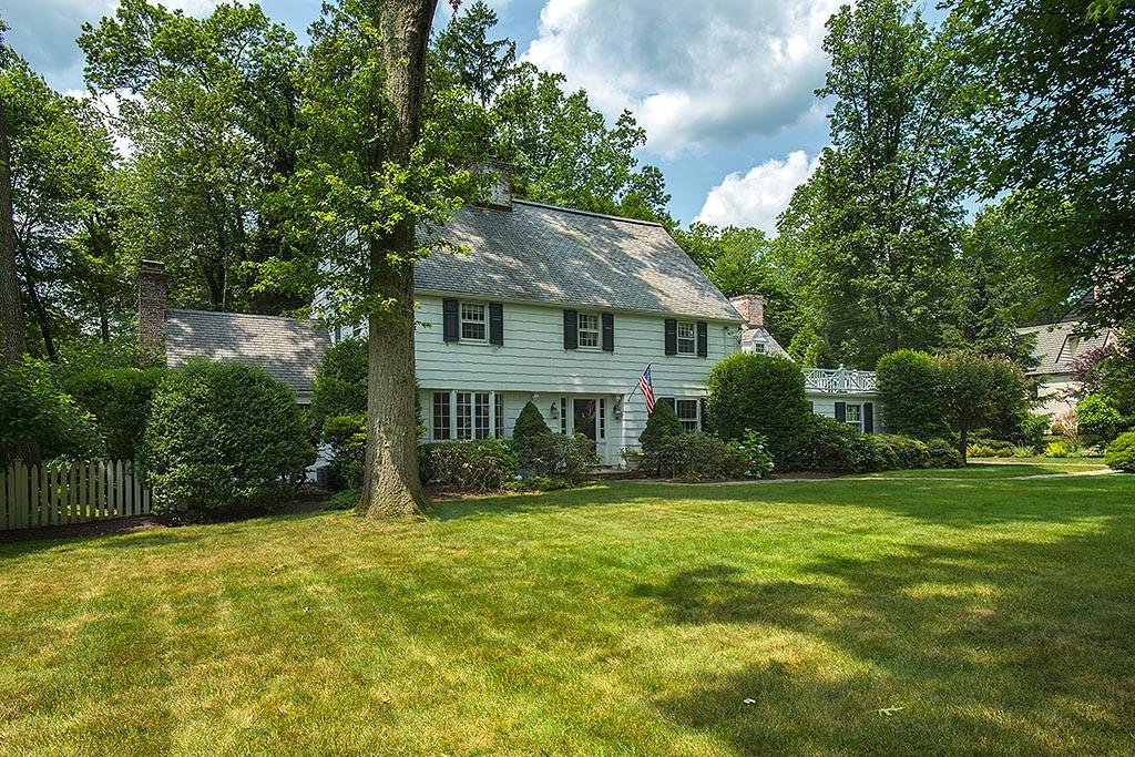 33 Birch Road Darien, CT 06820 - Photo 29 of 33 a front view of house with yard and green space