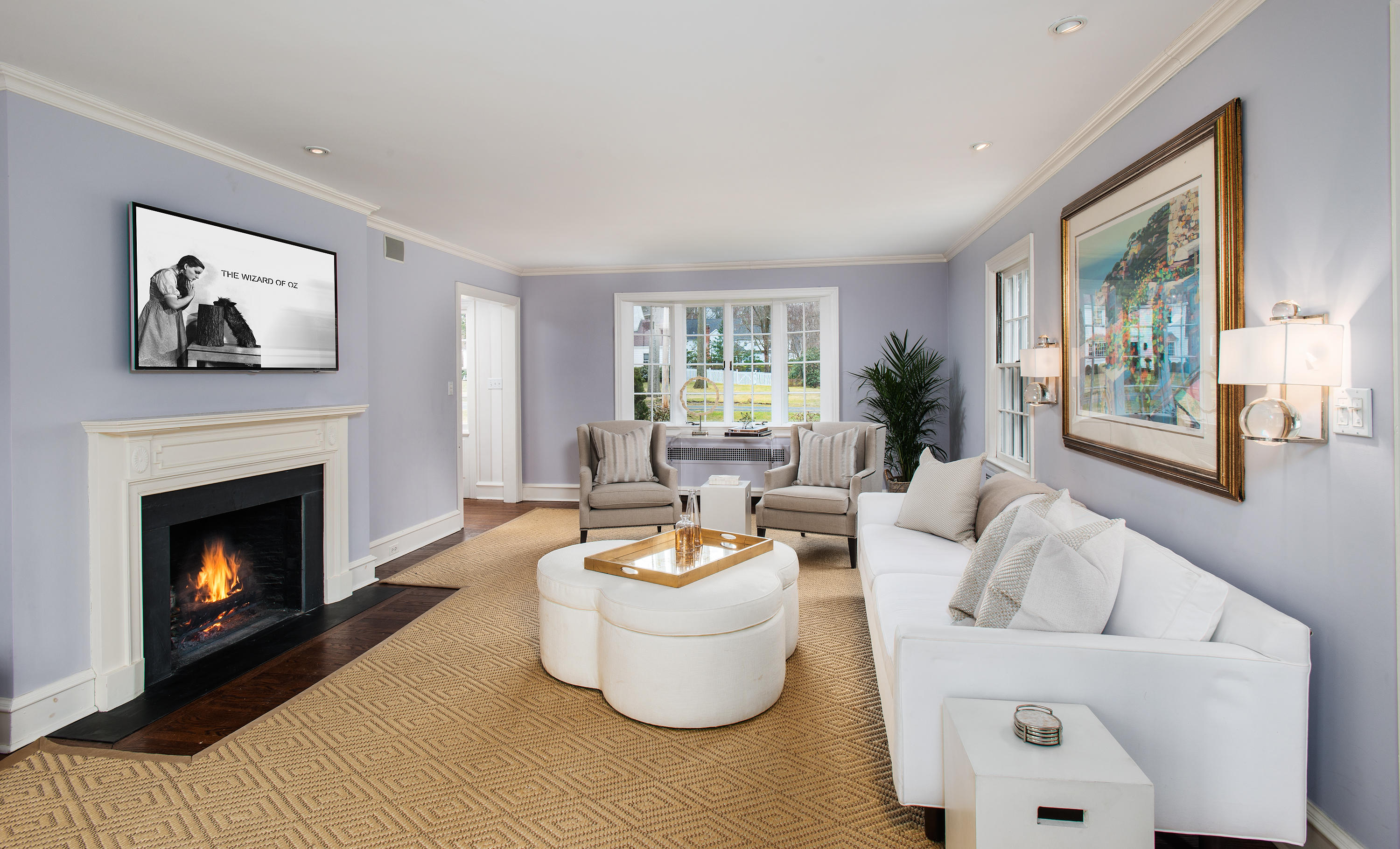 33 Birch Road Darien, CT 06820 - Photo 5 of 33 a living room with furniture and a fireplace