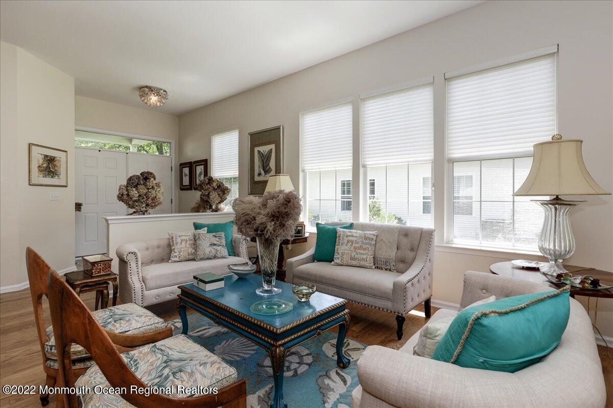 2513 Morningstar Road Manasquan, NJ 08736 - Photo 14 of 69 a living room with furniture a rug and a large window