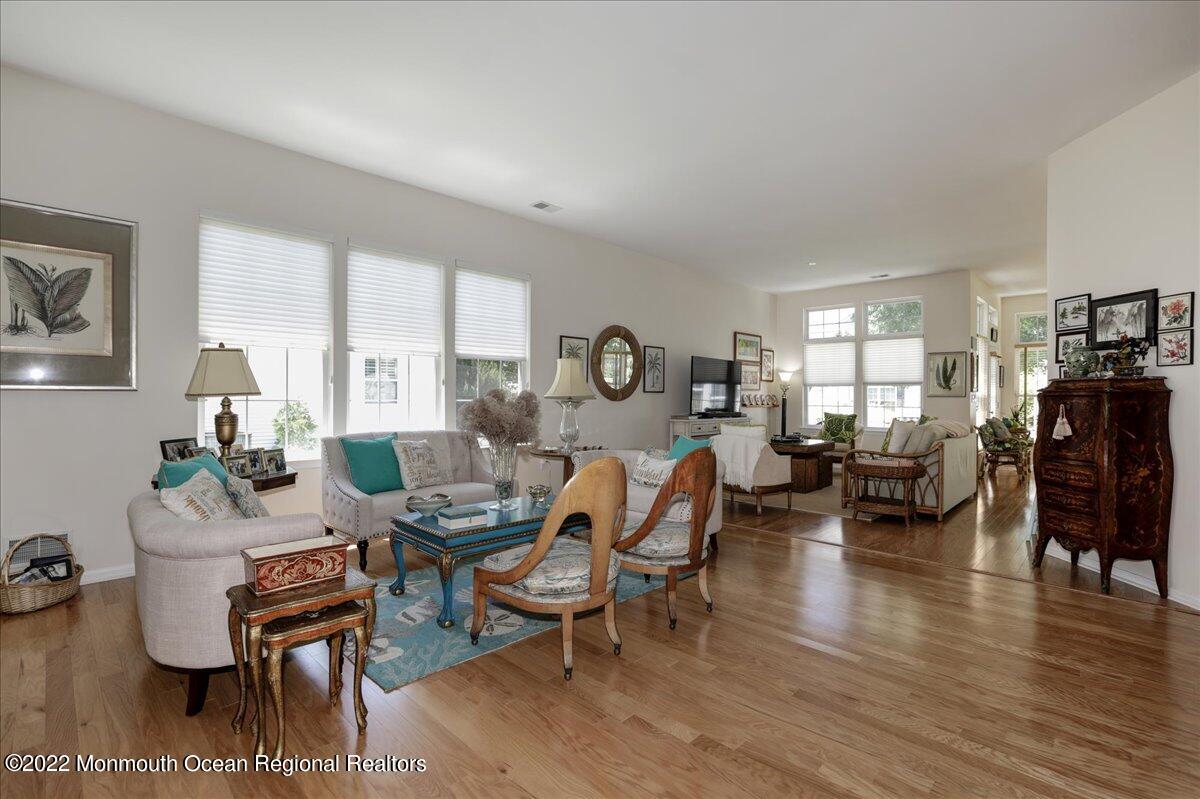 2513 Morningstar Road Manasquan, NJ 08736 - Photo 17 of 69 a living room with fireplace furniture and a wooden floor