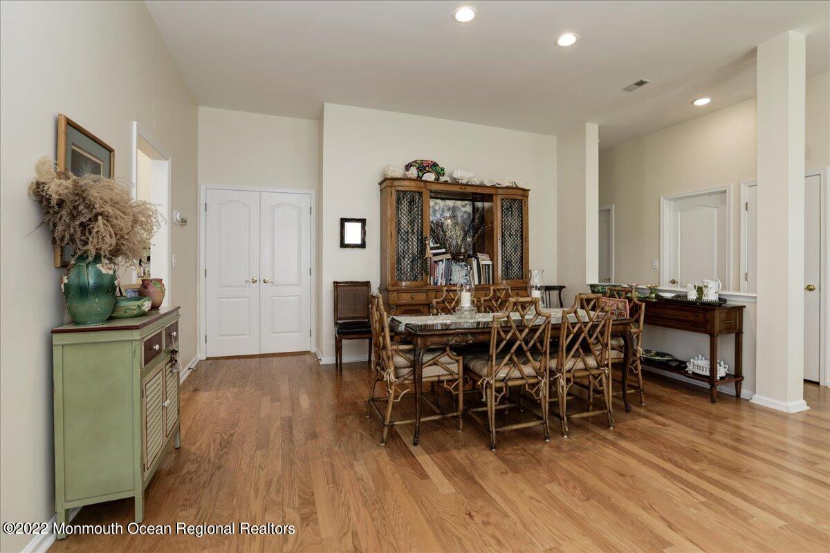 2513 Morningstar Road Manasquan, NJ 08736 - Photo 21 of 69 a view of a dining room with furniture and wooden floor