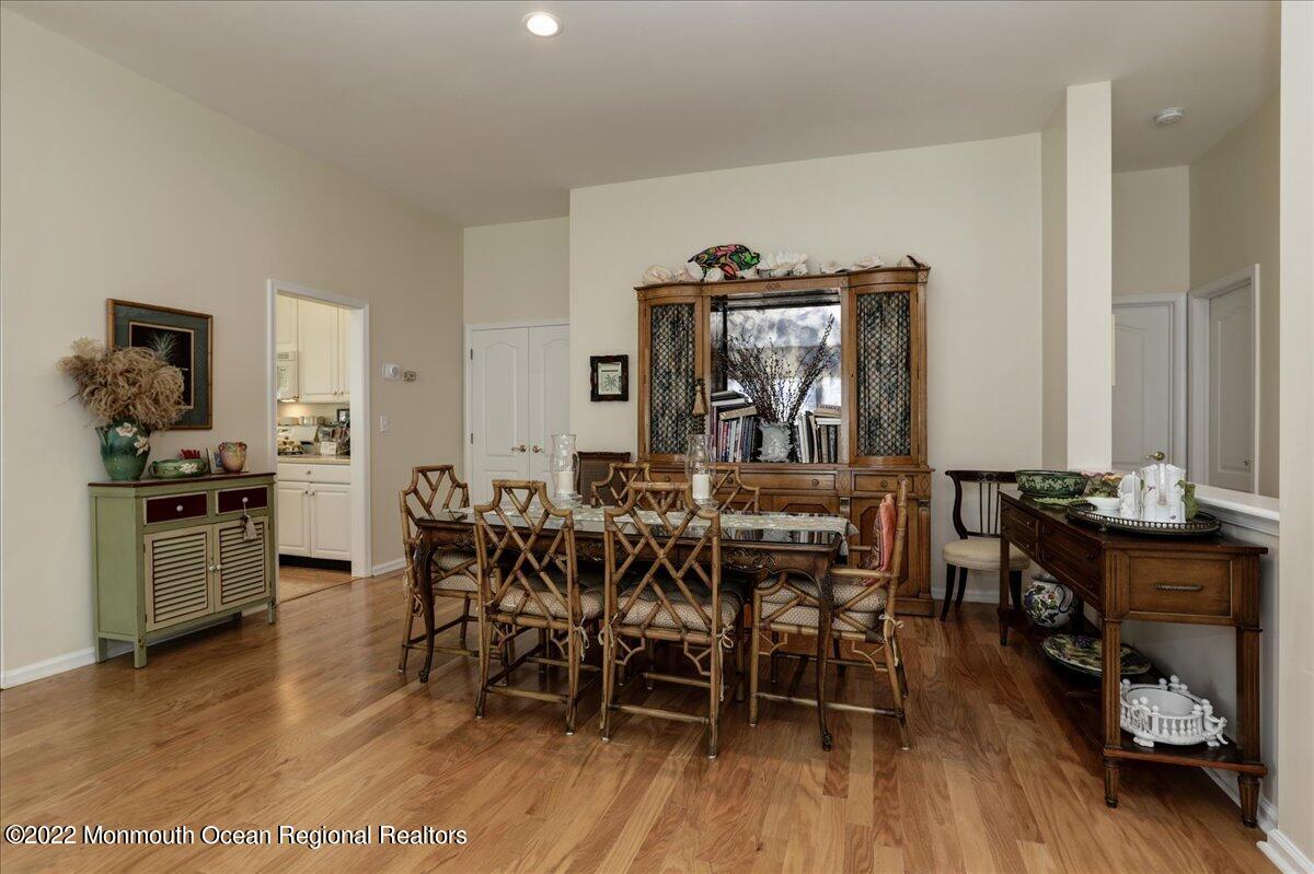 2513 Morningstar Road Manasquan, NJ 08736 - Photo 23 of 69 a view of a dining room with furniture and wooden floor