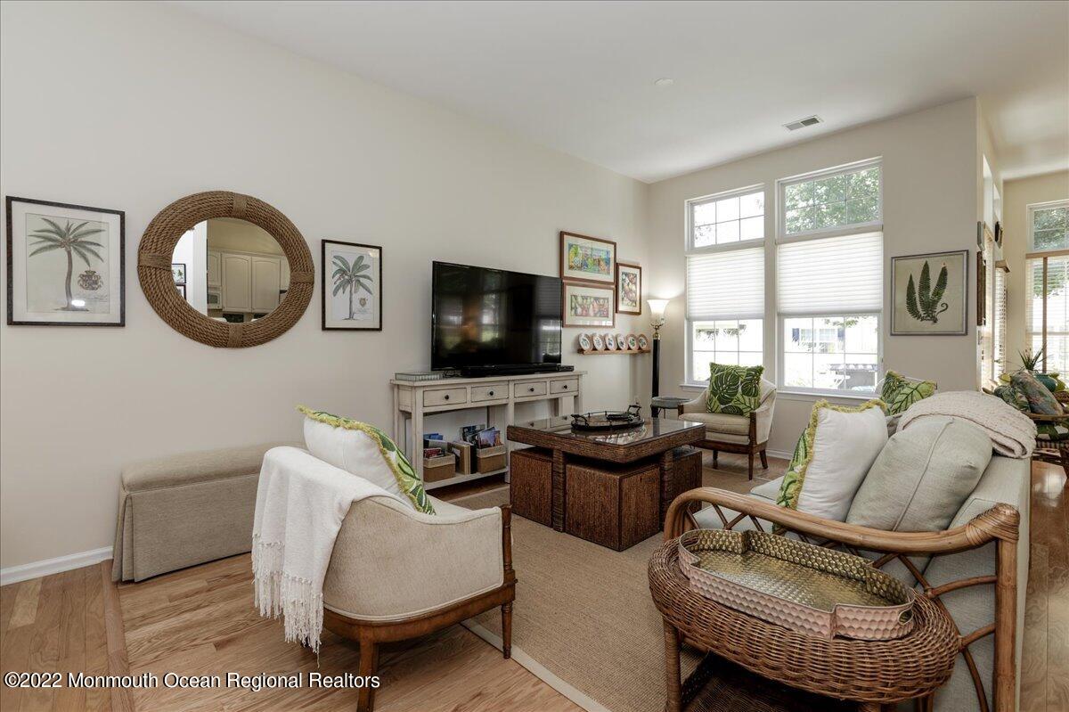 2513 Morningstar Road Manasquan, NJ 08736 - Photo 24 of 69 a living room with furniture and a flat screen tv