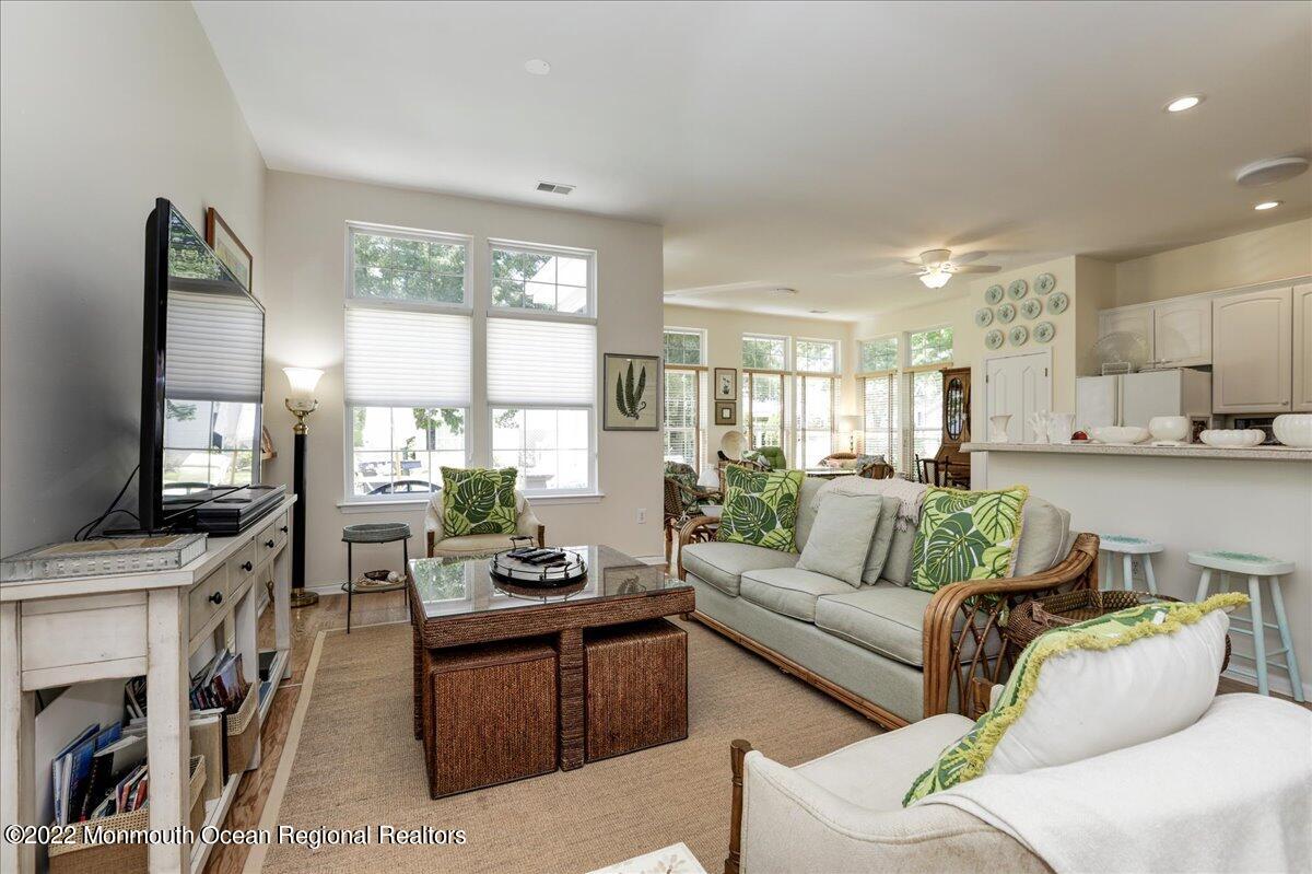 2513 Morningstar Road Manasquan, NJ 08736 - Photo 25 of 69 a living room with furniture and a flat screen tv