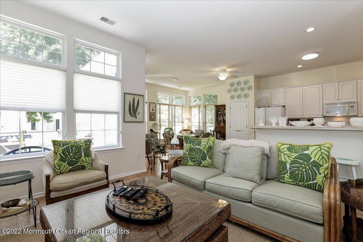 2513 Morningstar Road Manasquan, NJ 08736 - Photo 27 of 69 a living room with furniture and a large window