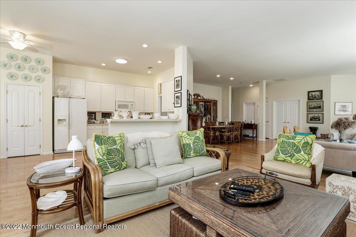 2513 Morningstar Road Manasquan, NJ 08736 - Photo 28 of 69 a living room with furniture kitchen view and a table