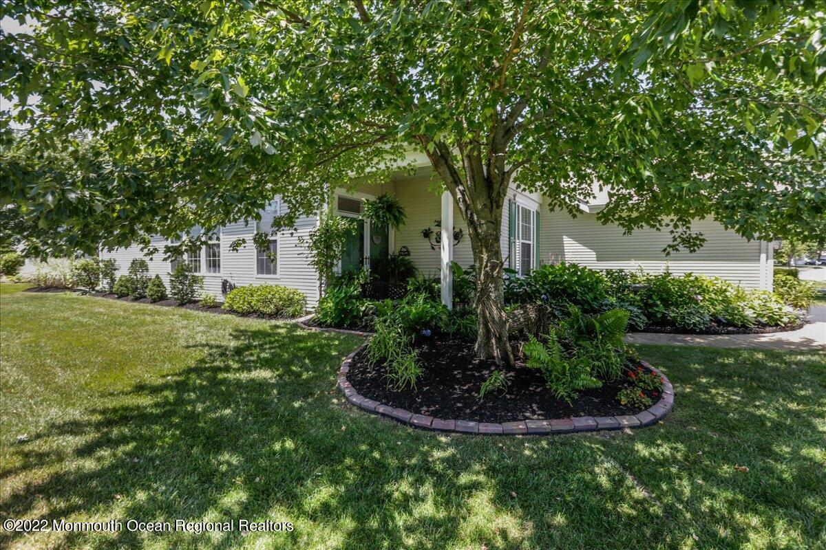 2513 Morningstar Road Manasquan, NJ 08736 - Photo 3 of 69 a view of a house with garden and trees