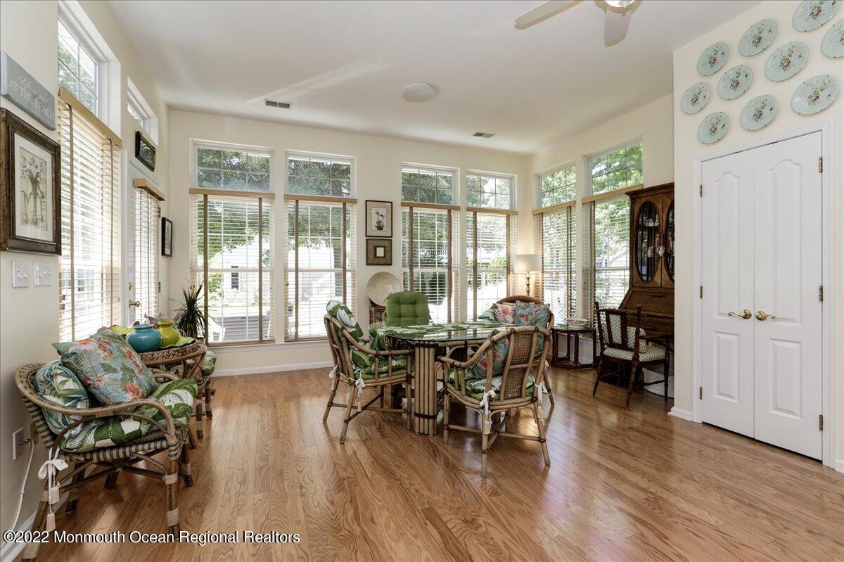2513 Morningstar Road Manasquan, NJ 08736 - Photo 35 of 69 a living room with furniture and wooden floor