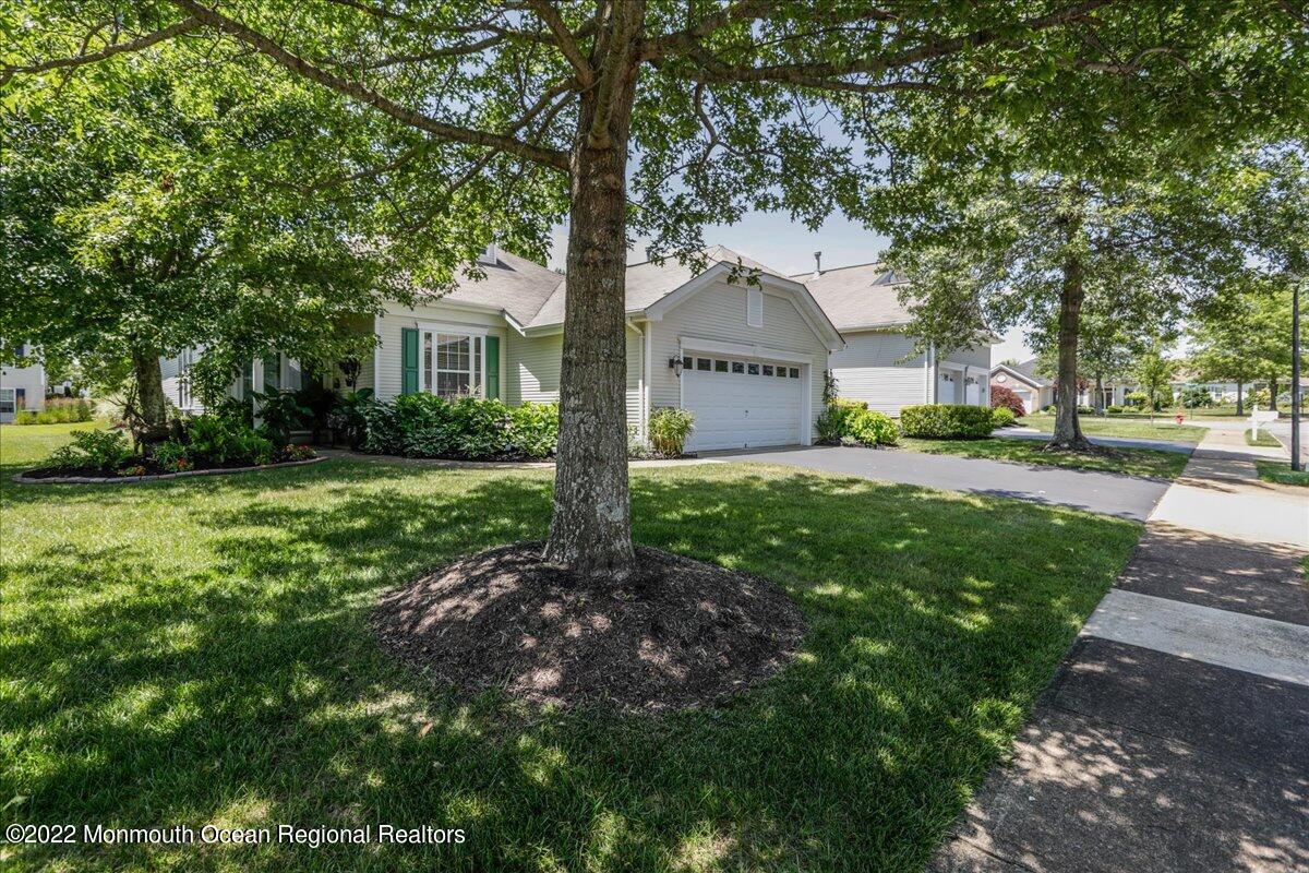 2513 Morningstar Road Manasquan, NJ 08736 - Photo 4 of 69 a front view of a house with garden