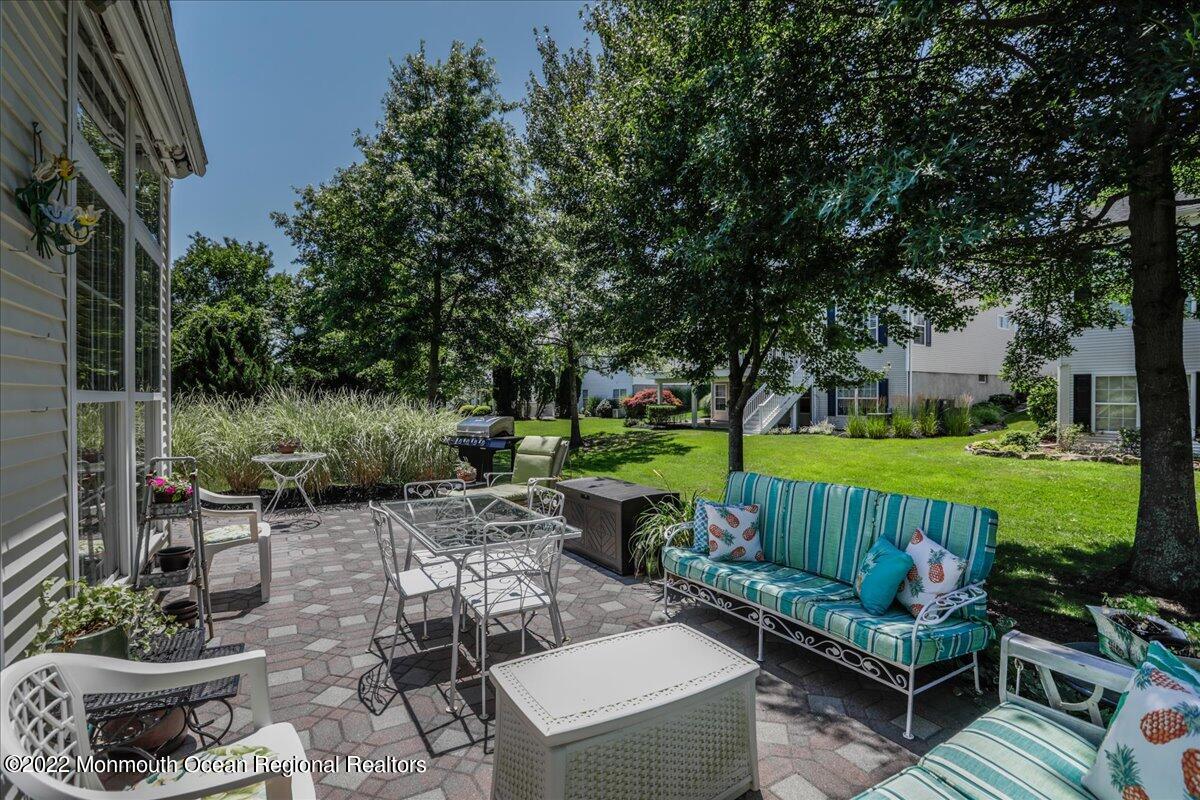 2513 Morningstar Road Manasquan, NJ 08736 - Photo 59 of 69 a view of a couches in patio and a yard