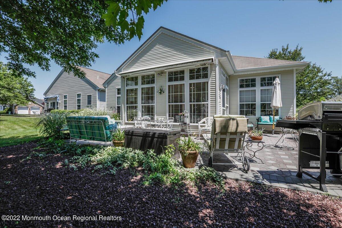 2513 Morningstar Road Manasquan, NJ 08736 - Photo 63 of 69 a house view with a sitting space and garden