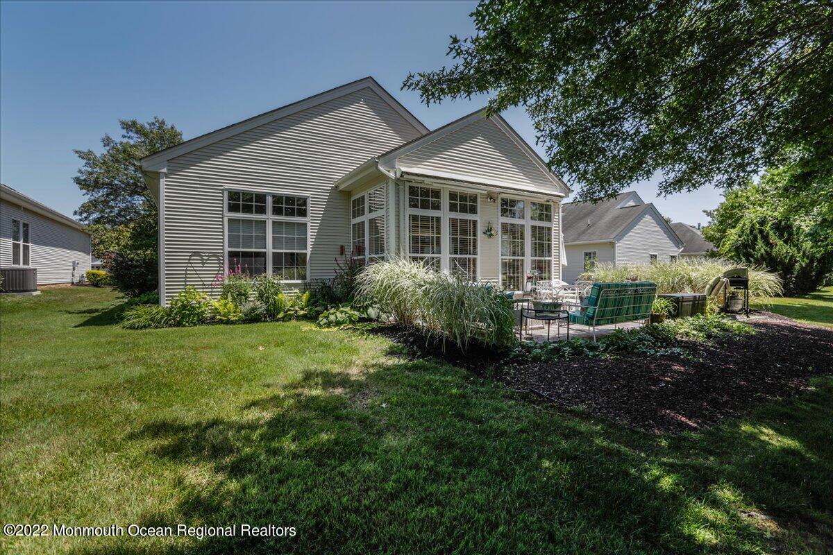 2513 Morningstar Road Manasquan, NJ 08736 - Photo 65 of 69 a view of a house with yard and plants