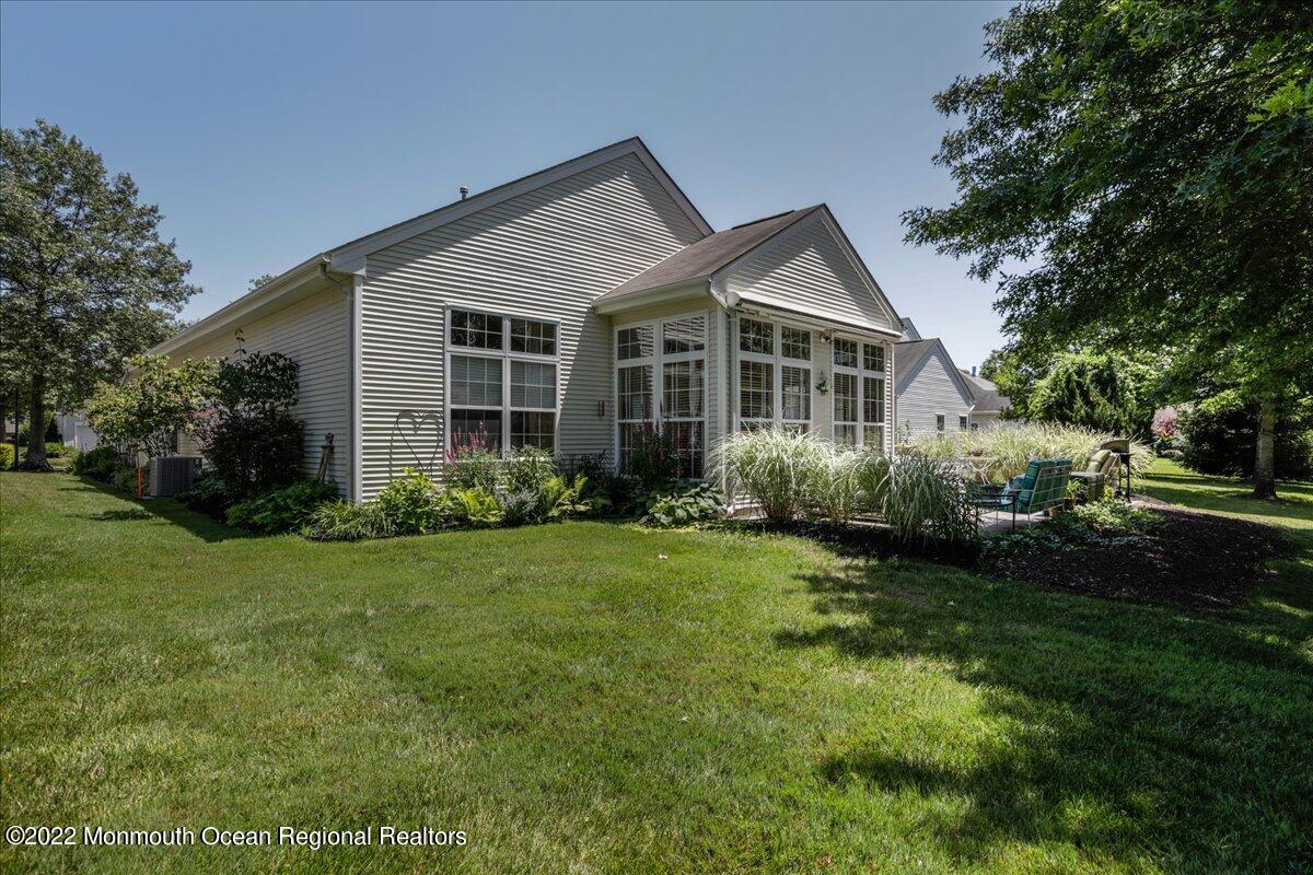 2513 Morningstar Road Manasquan, NJ 08736 - Photo 66 of 69 a front view of house with yard and green space
