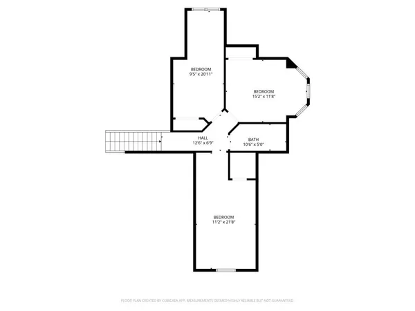 a view of a house with a yard and garage