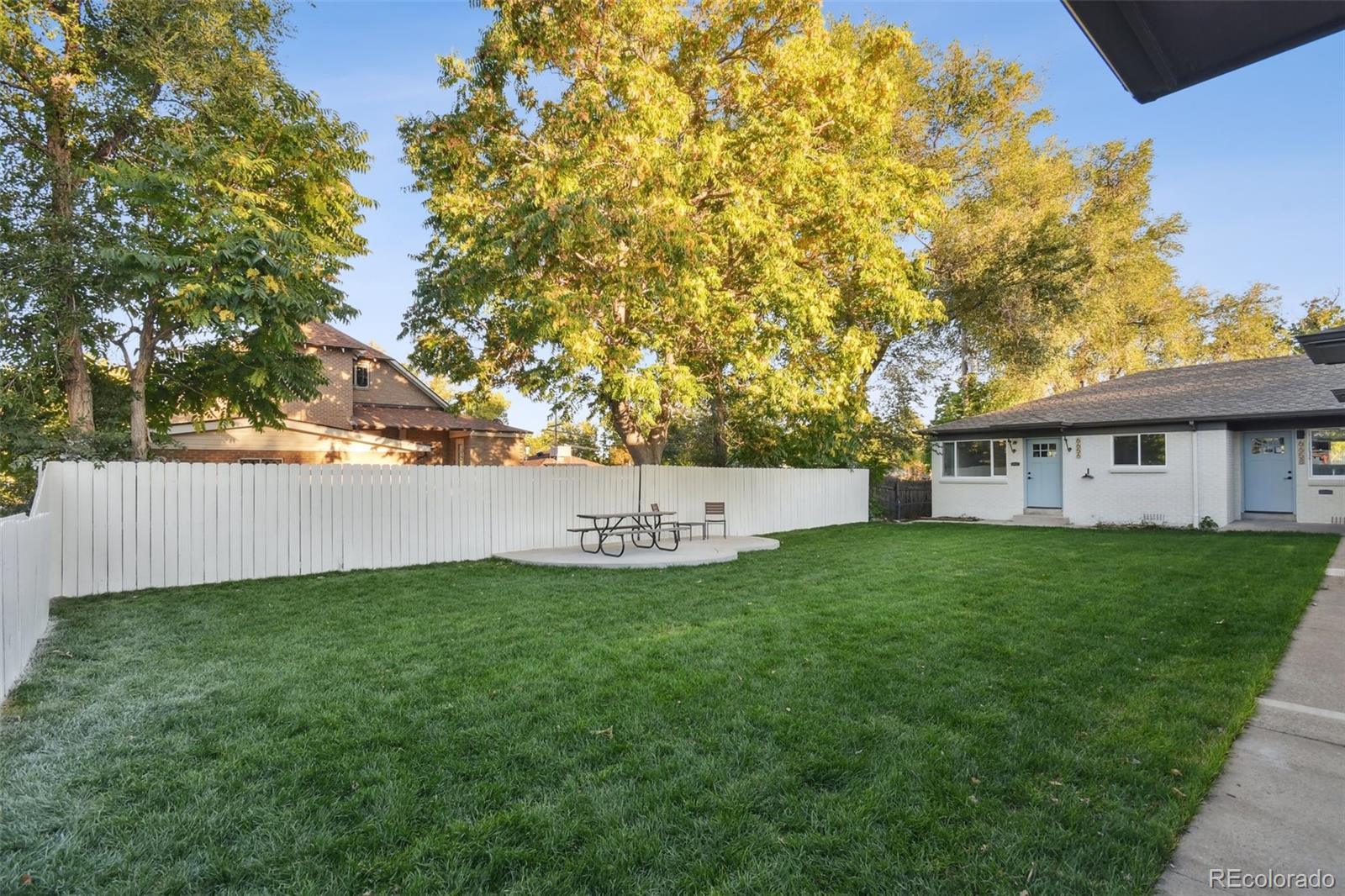 6650 West 46th Place Wheat Ridge, CO 80033 - Photo 22 of 23 a view of a house with backyard and garden