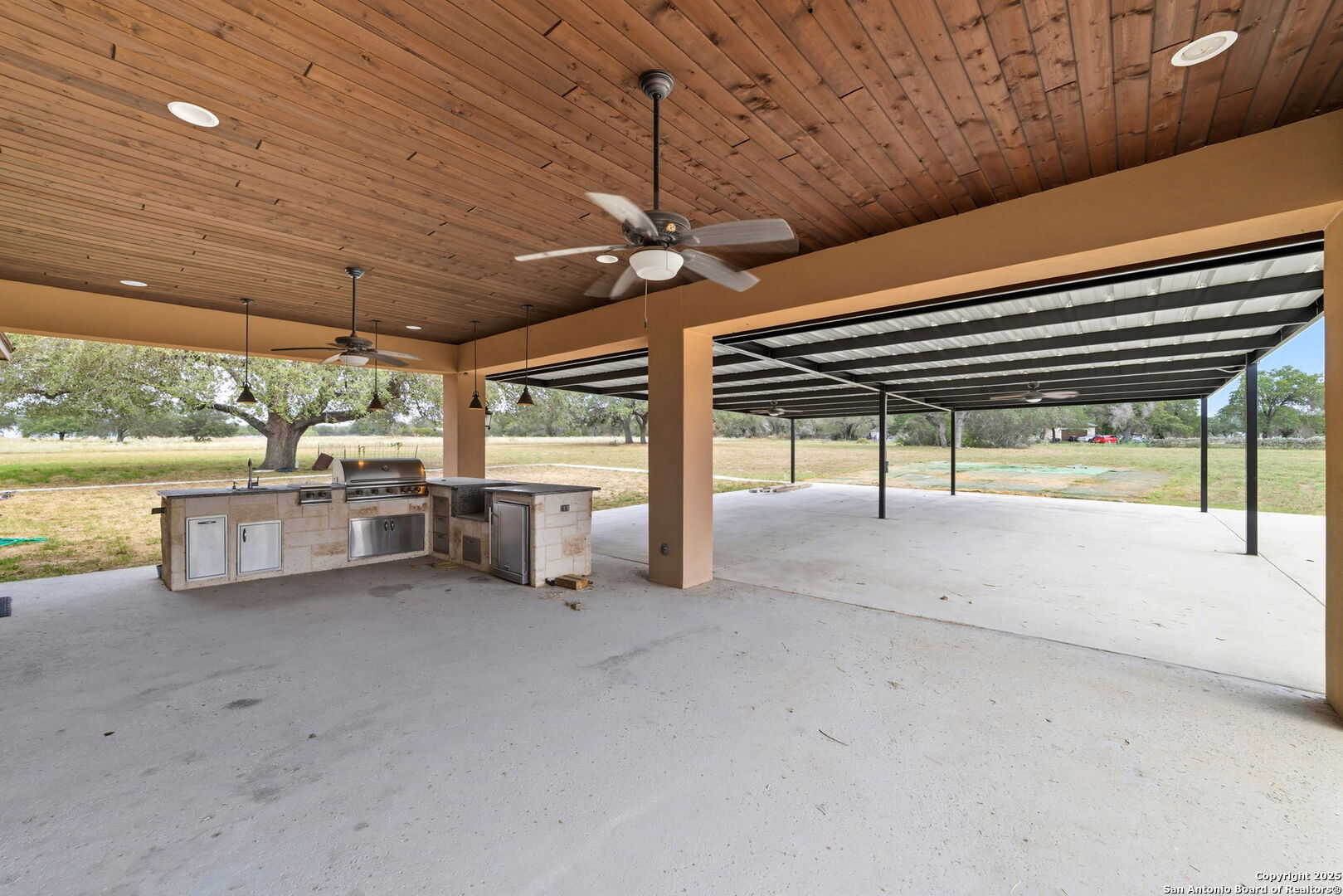 3172 Interstate 35 Natalia, TX 78059 - Photo 22 of 26 a view of a room with wooden ceiling