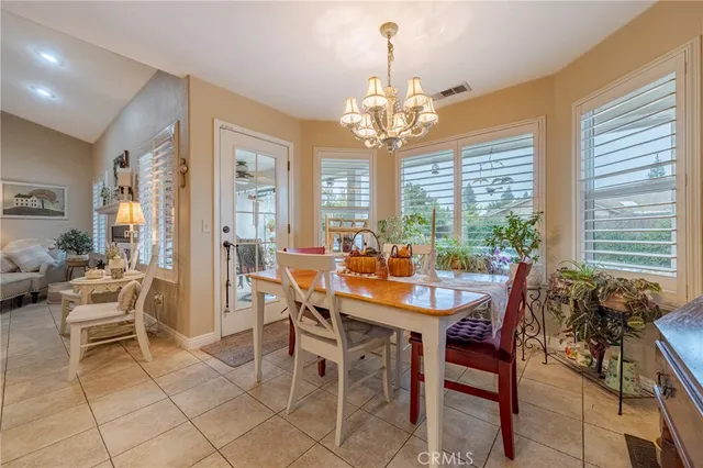 a kitchen with stainless steel appliances granite countertop a stove microwave and sink