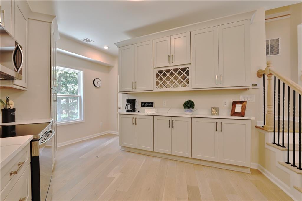 2125 Clay Road Southwest Austell, GA 30106 - Photo 11 of 25 a view of cabinets with wooden floor