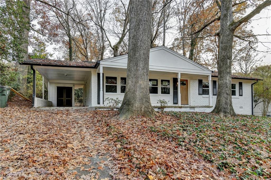 2137 Plantation Lane Chamblee, GA 30341 - Photo 1 of 54 front view of a house with a yard