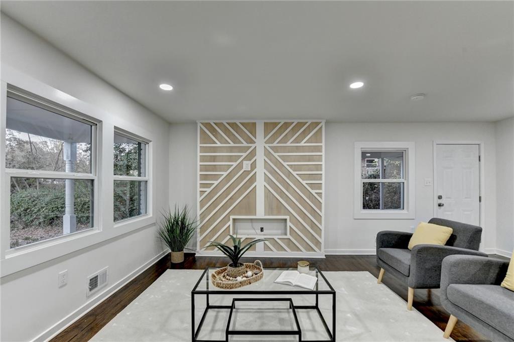 2137 Plantation Lane Chamblee, GA 30341 - Photo 14 of 54 a living room with furniture and a large window