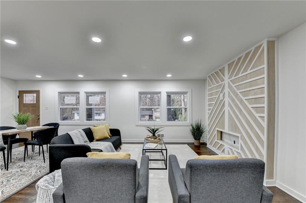 2137 Plantation Lane Chamblee, GA 30341 - Photo 16 of 54 a living room with furniture and a large window