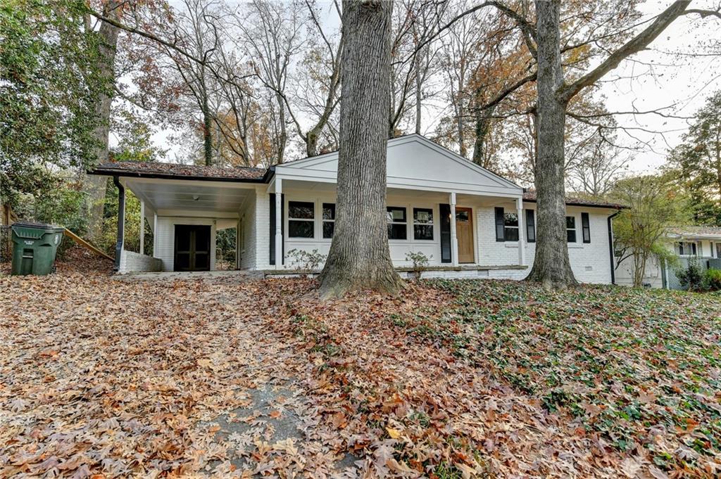 2137 Plantation Lane Chamblee, GA 30341 - Photo 2 of 54 front view of a house with a yard
