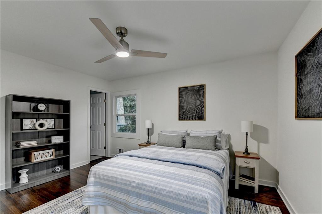 2137 Plantation Lane Chamblee, GA 30341 - Photo 41 of 54 a bedroom with a bed and a tv