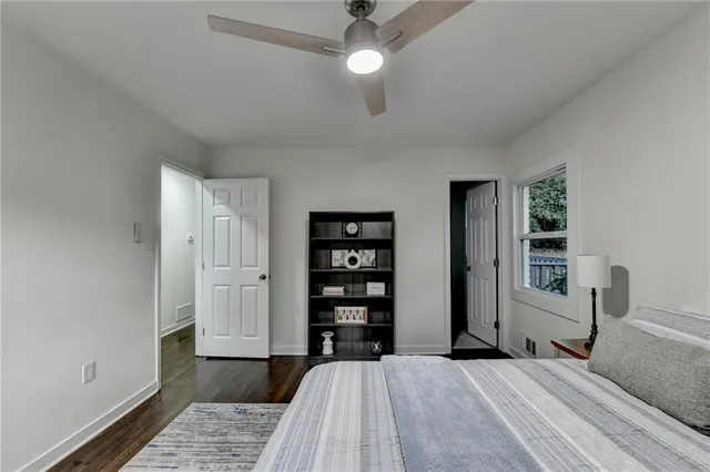 a bathroom with a shower and a shower curtain
