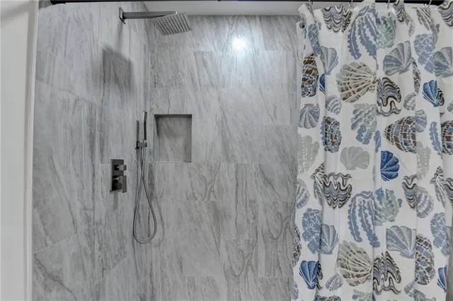 a view of a hallway with closet