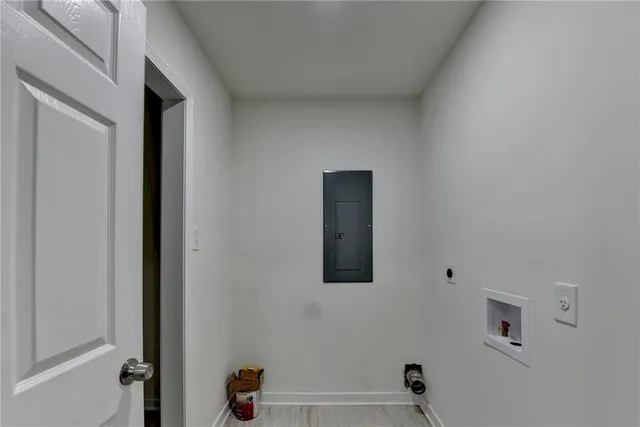 a balcony with wooden floor and fence