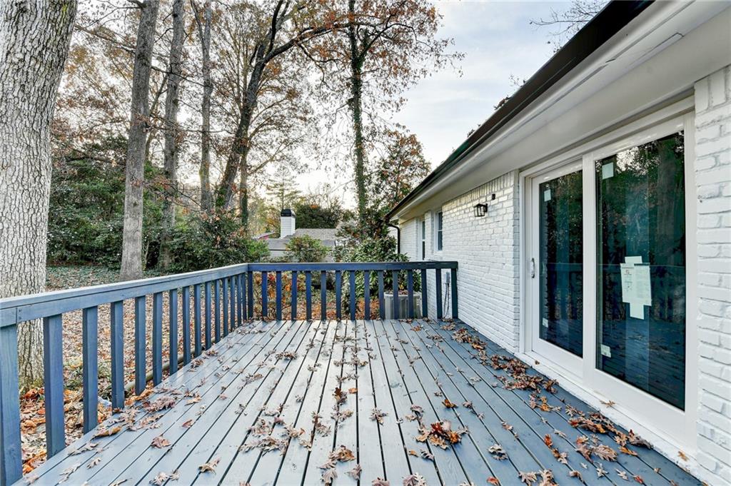 2137 Plantation Lane Chamblee, GA 30341 - Photo 48 of 54 a view of backyard with a deck and wooden floor