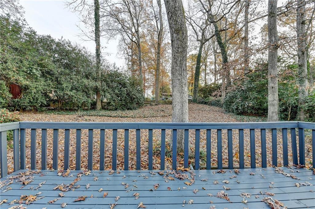 2137 Plantation Lane Chamblee, GA 30341 - Photo 49 of 54 a balcony with wooden floor and fence