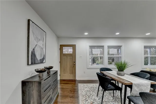 a view of a livingroom with furniture and window