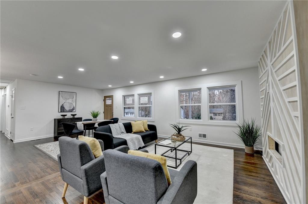 2137 Plantation Lane Chamblee, GA 30341 - Photo 10 of 54 a living room with furniture window and wooden floor